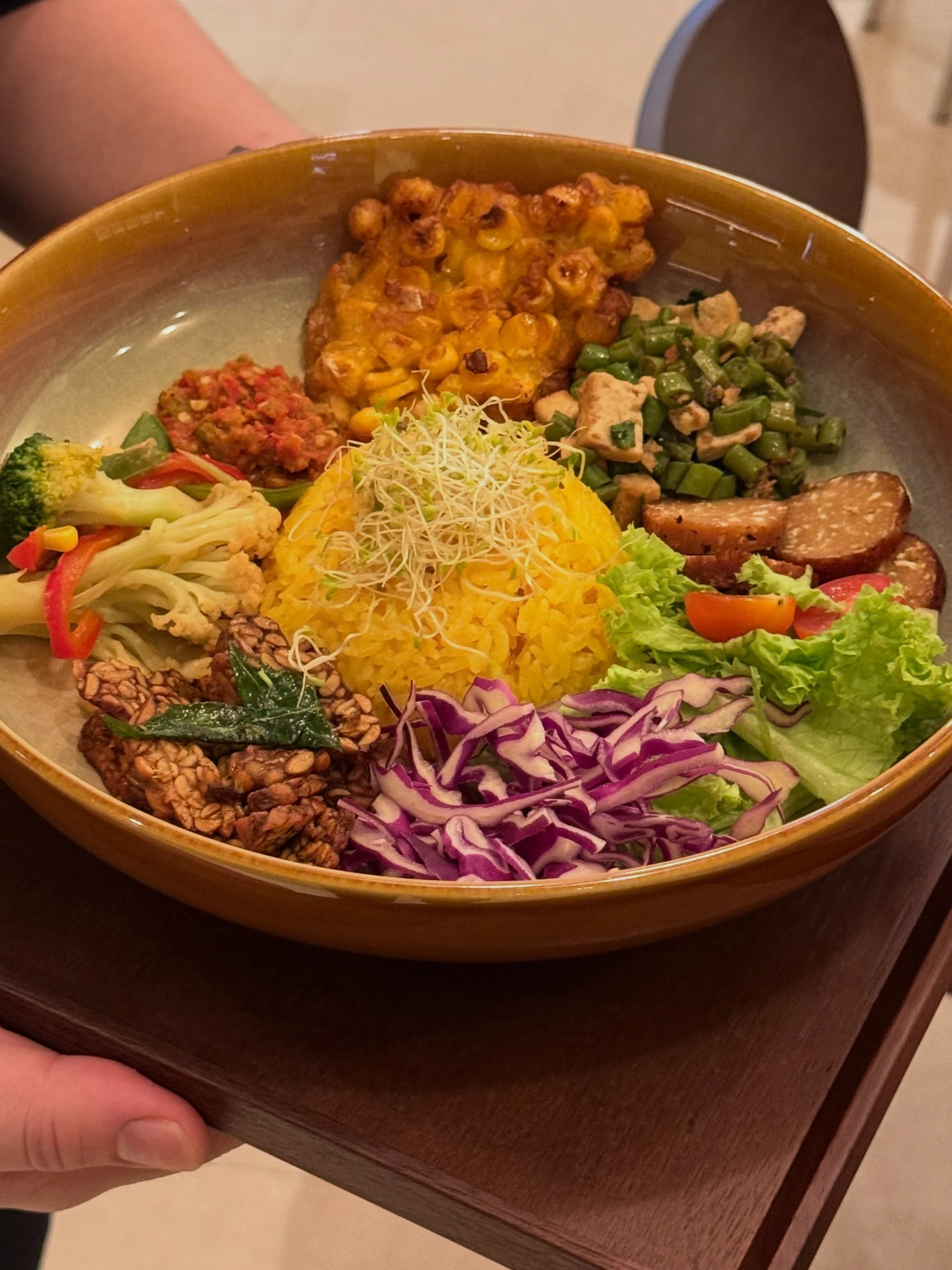 Close-up of a vibrant vegetarian rice bowl at Ascend Signature